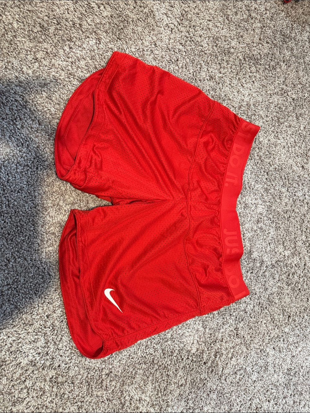 Nike Women’s Red Mesh Sport Shorts with White Swoosh